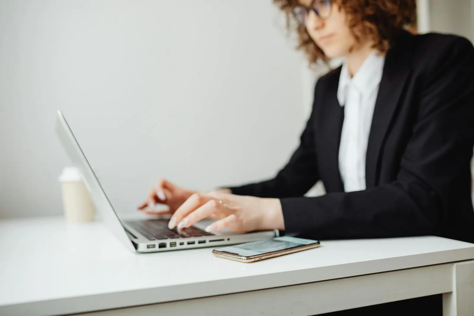 Woman in office responding to solar power inquiries